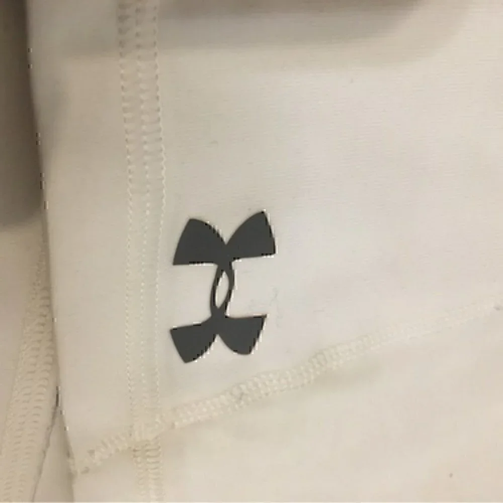 Under Armour woman’s size xsmall white spandex shorts